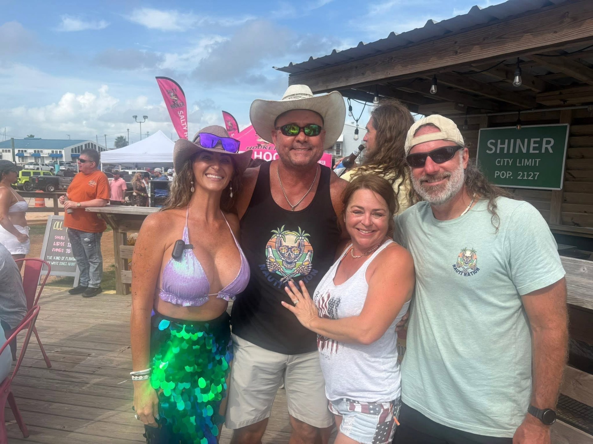 Four NautiFest attendees enjoying the day together