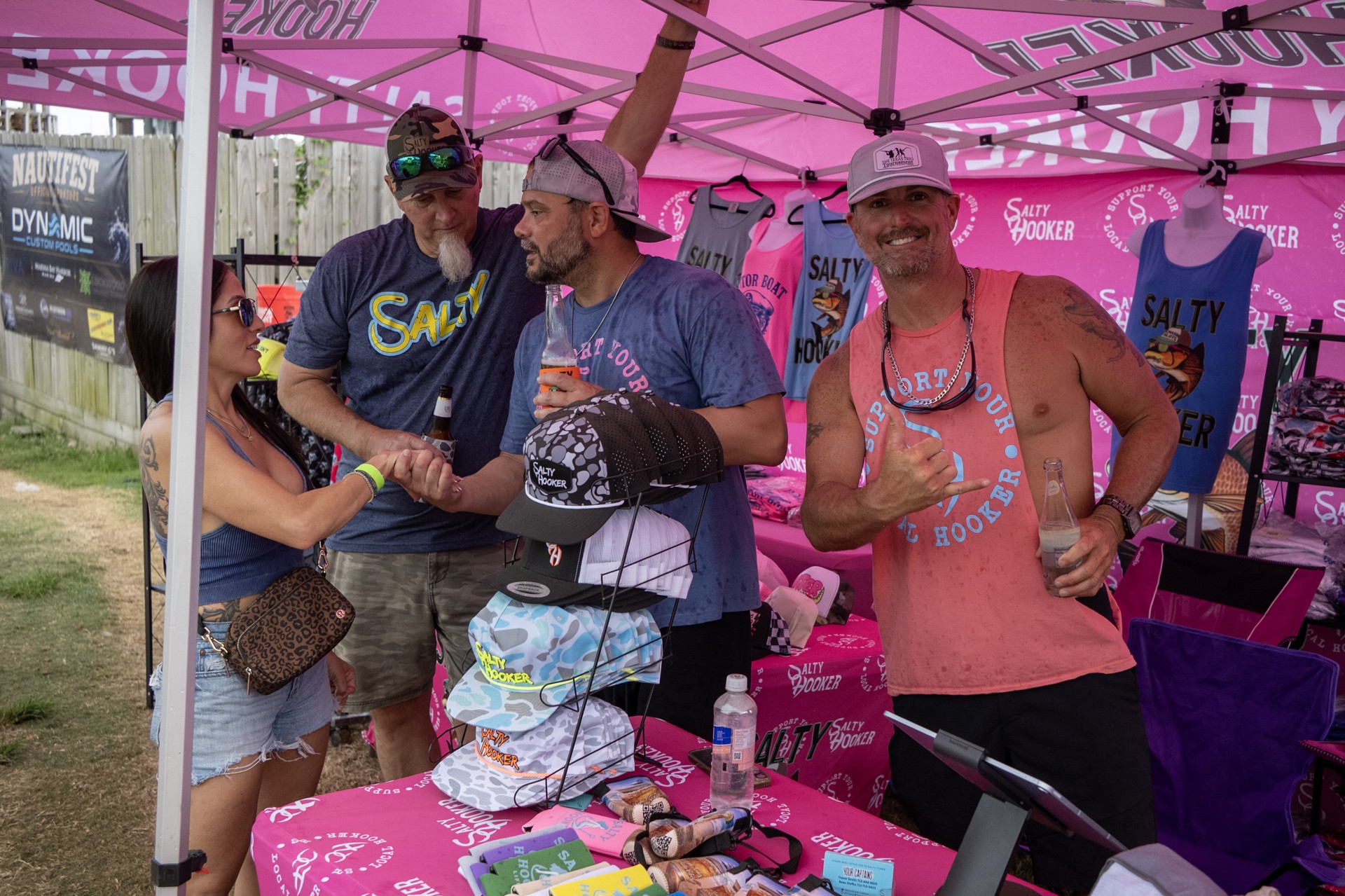 Celebrating at a NautiFest vendor booth